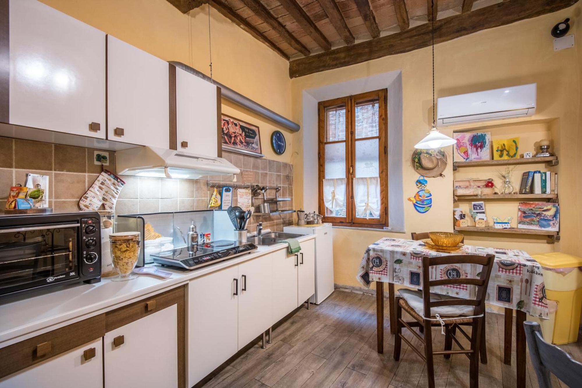 La Casa Gialla Di Buonconvento Bagian luar foto