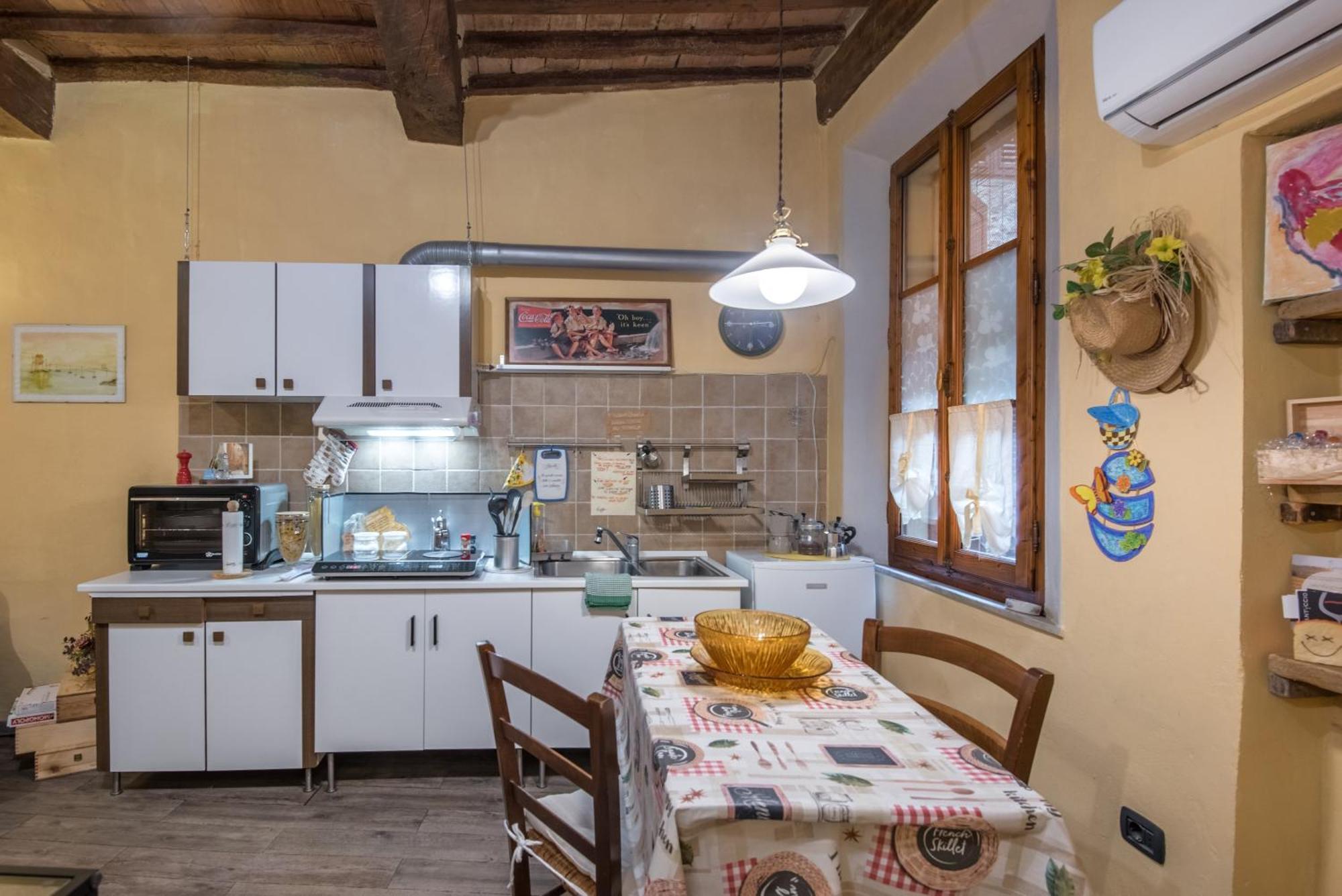 La Casa Gialla Di Buonconvento Bagian luar foto